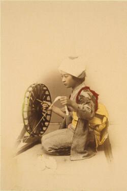 Girl Spinning Cotton