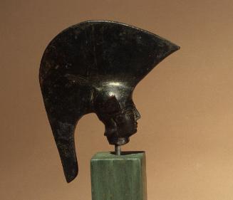 Head of a votive figurine of a warrior