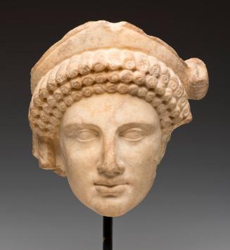 Archaistic female head