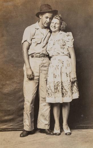Untitled [young man with arm around woman]