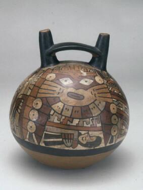 Double spout and bridge vessel with mythological being