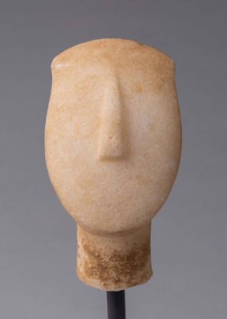 Head of a figurine (folded-arm type)