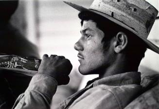 Young Man with Union Brochure, from the series, "Farmworkers"