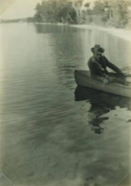 Man with Hat in Boat