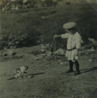 Girl Playing with Cat