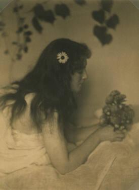 Young Woman Lying on Stomach with Flowers
