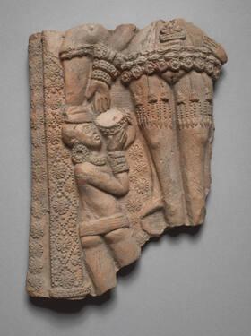 Plaque Fragment with Male Attendant Holding up an Offering Bowl to Goddess