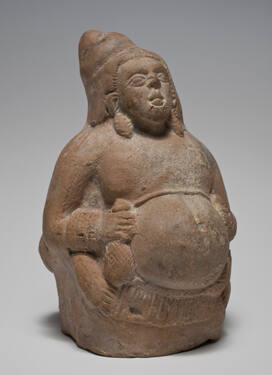 Rattle in the Form of a Yaksha (Nature Spirit) Holding a Money Bag, Precursor of Kubera (God of Wealth)