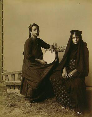 Two Women Seated, One with Tambourine