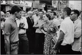 As Demonstrators Block Traffic in Front of Leb's Restaurant, a Mob Begins to Abuse Them with Kicks, Blows, and Burning Cigarettes. An Anonymous Woman Confronts the Mob and Joins the Demonstrators, Atlanta, Georgia