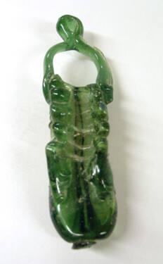 Balsamarium with twisted loop handle