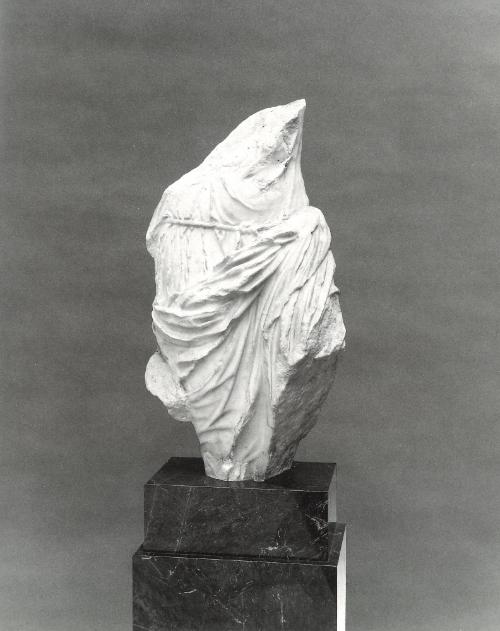 Fragmentary draped female torso