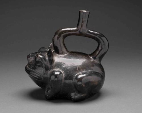 Blackware stirrup spout vessel in the form of a jaguar frog