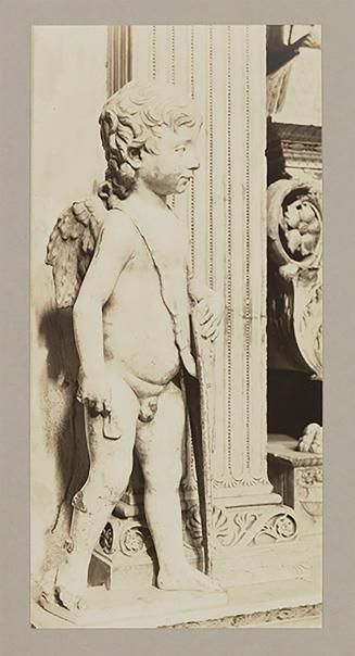 Putto at head of bier; Whole, facing four fifths right