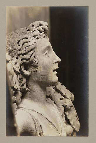 Youth bearing garland above foot of bier; Head, in profile to the right