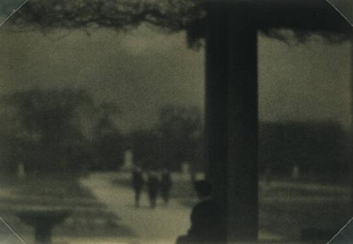 Three Figures Walking toward Fountain