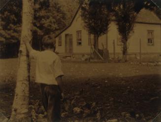 Boy Looking toward House