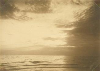 Dramatic Clouds over Lapping Waves