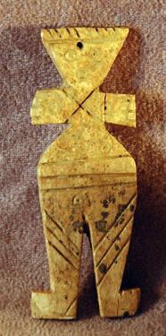 Standing figure with triangular head