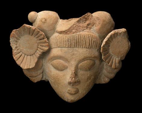 Head of a Woman with Sunflower Ornaments