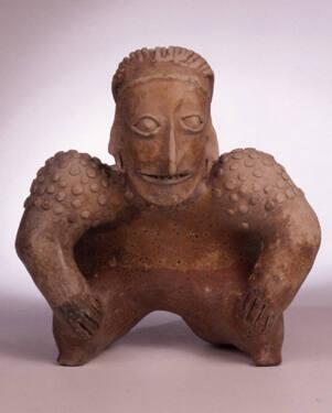 Hunchbacked figure